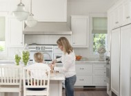Kitchen Islands Here, a large island creates valuable functionality due to its storage space, dining area and large surface for prep work.