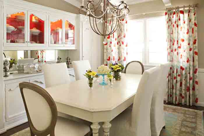     Airy and welcoming, this dining room is ready for guests thanks to it's functional design elements.
