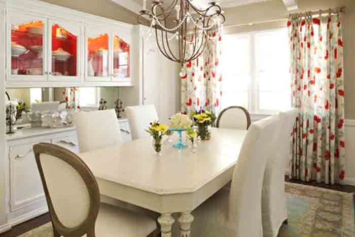 Airy and welcoming, this dining room is ready for guests thanks to it's functional design elements. Airy and welcoming, this dining room is ready for guests thanks to it's functional design elements.