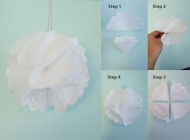 doily ball A fun and festive DIY, this clever doily ball will add help you show off your vintage style at your New Year's celebration. For an even more festive look, use sparkly ribbon and check party supply stores for metallic paper doilies.