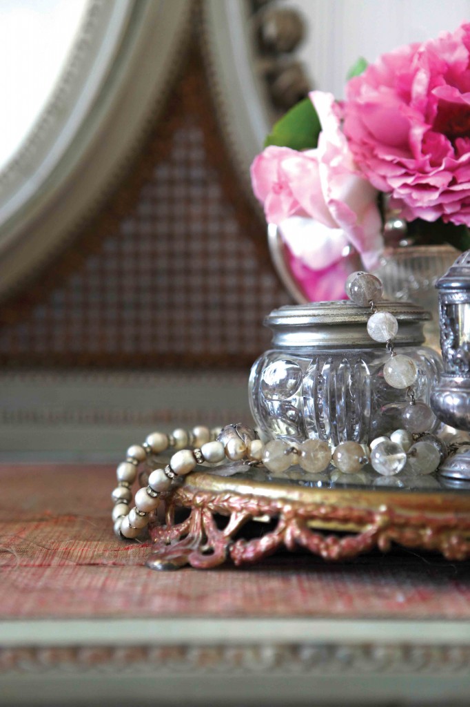 Display jewelry and fresh flowers on a vanity