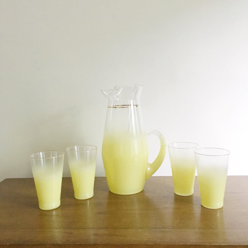 1960's West Virginia Glass "Blendo" Style Yellow Pitcher and Glassware Set on a wooden table