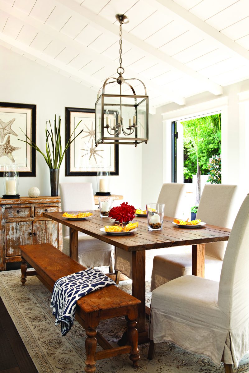 Cottage dining room with farmhouse table and transitional patriotic decor