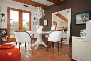 dining room with spanish tile and french furniture