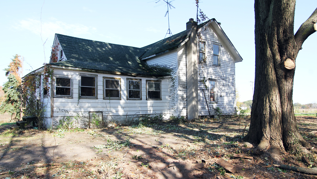 The Bridgers bought this farmhouse and saw potential in it when no ones else did. This is what the home looked like before renovations began.