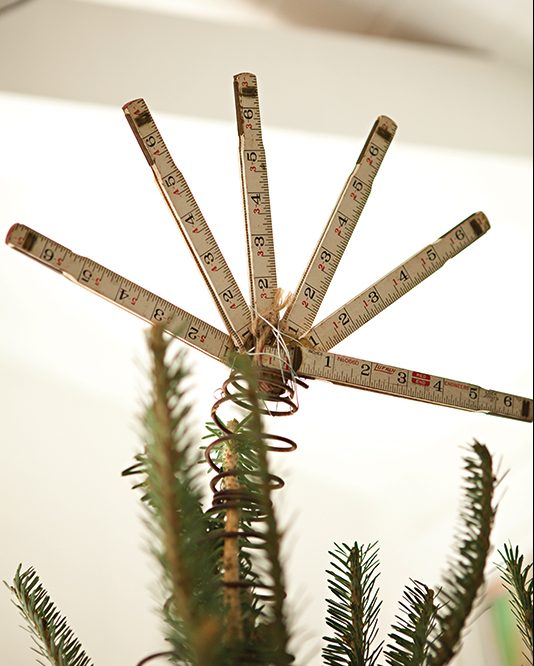 vintage collapsible yardstick is upcycled into a star shaped tree topper. 