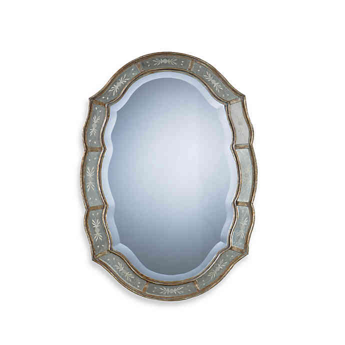 Antique inspired wall mirror with beveled edge. 