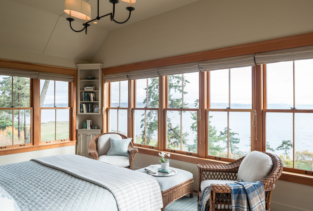 Bedroom with lake view in Bainbridge Island cottage