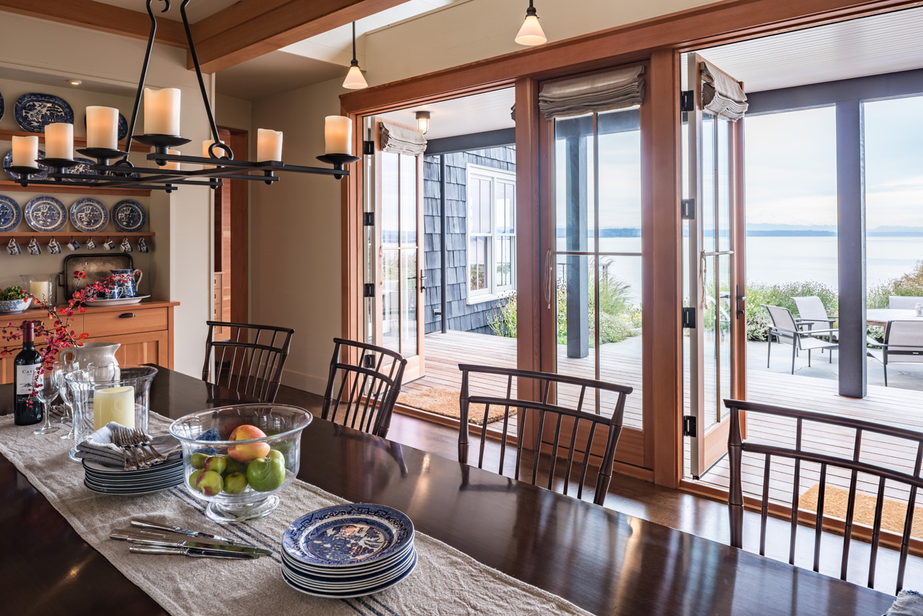 Dining Room with large open windows in the Bainbridge Island cottage