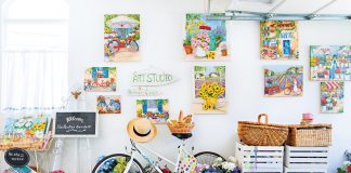 Studio garage filled with cheerful summertime art prints