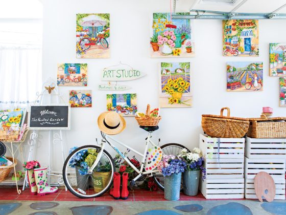Studio garage filled with cheerful summertime art prints