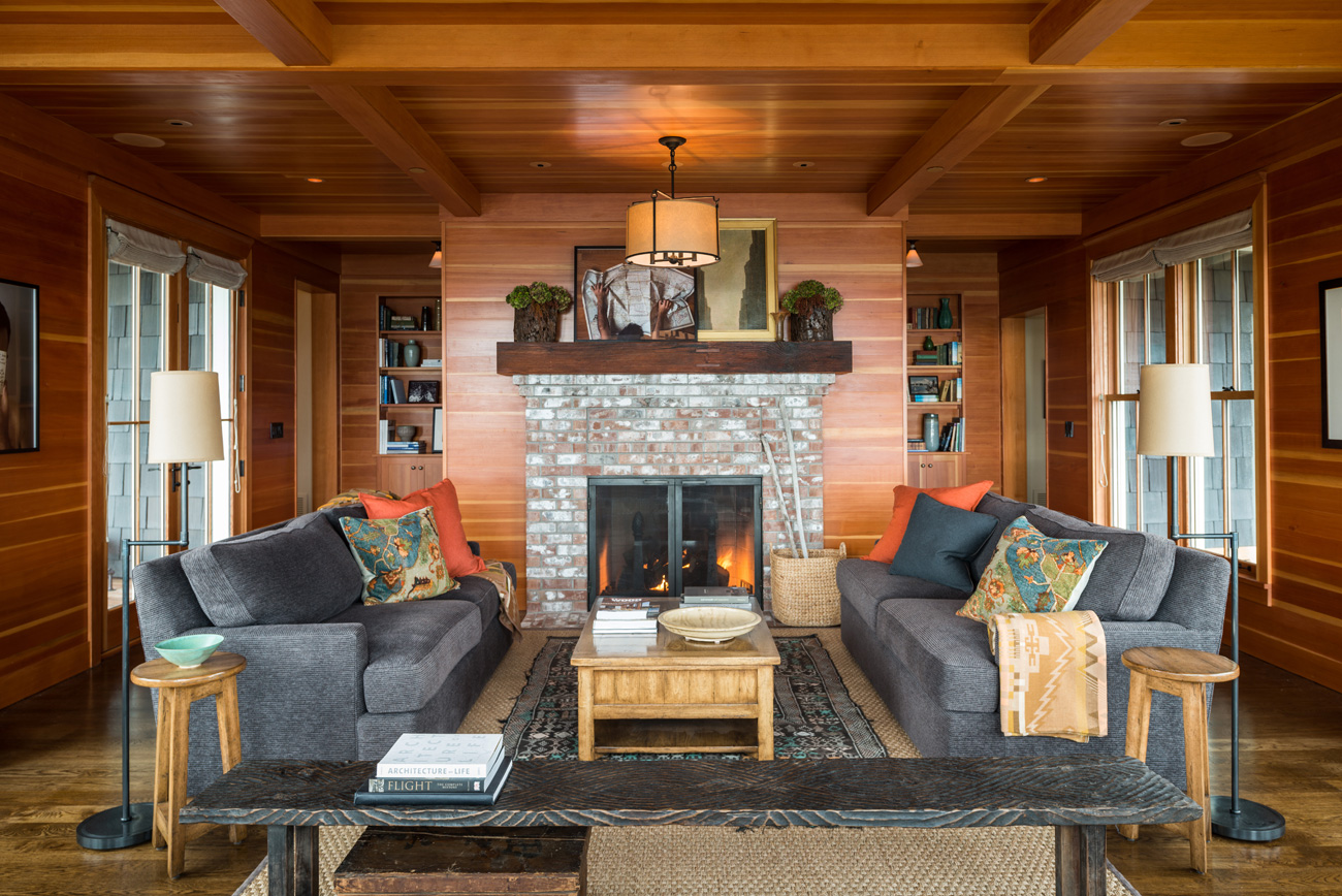 Stone fireplace and wood accents in Bainbridge Island cottage