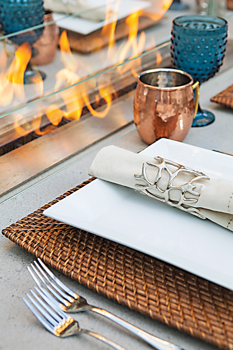 fire table details and dinnerware set up