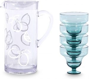 kate spade pitcher set with white lemon design on the pitcher and smokey aqua colored footed glasses