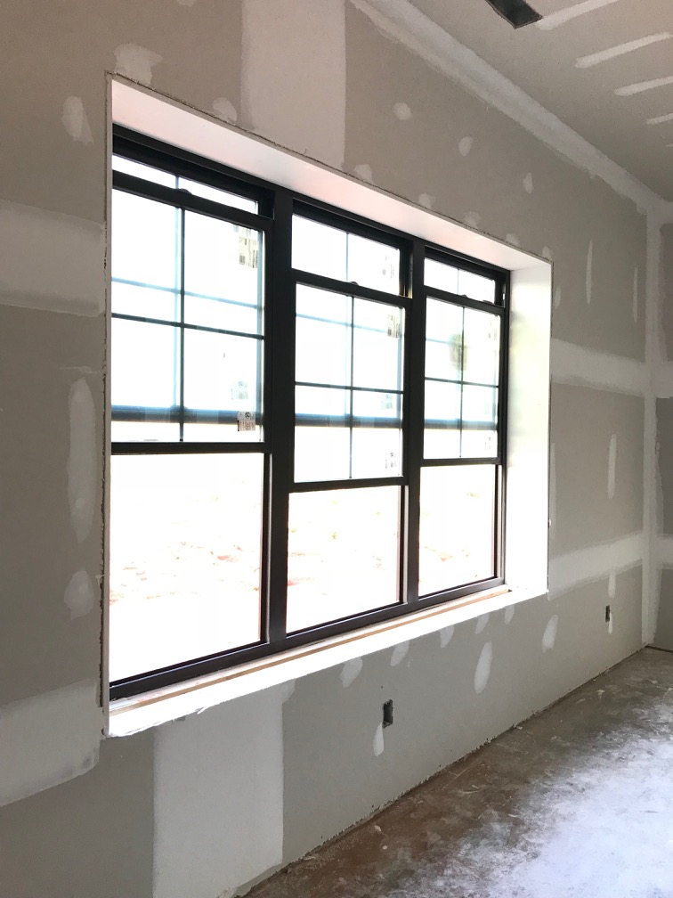 new window frames in a steel-framed farmhouse