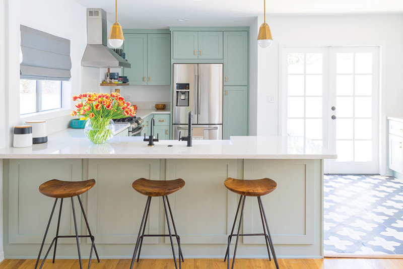 Island and sitting area in bright LA kitchen