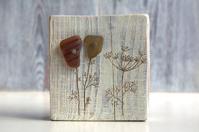 Simple rustic plant art with sea glass