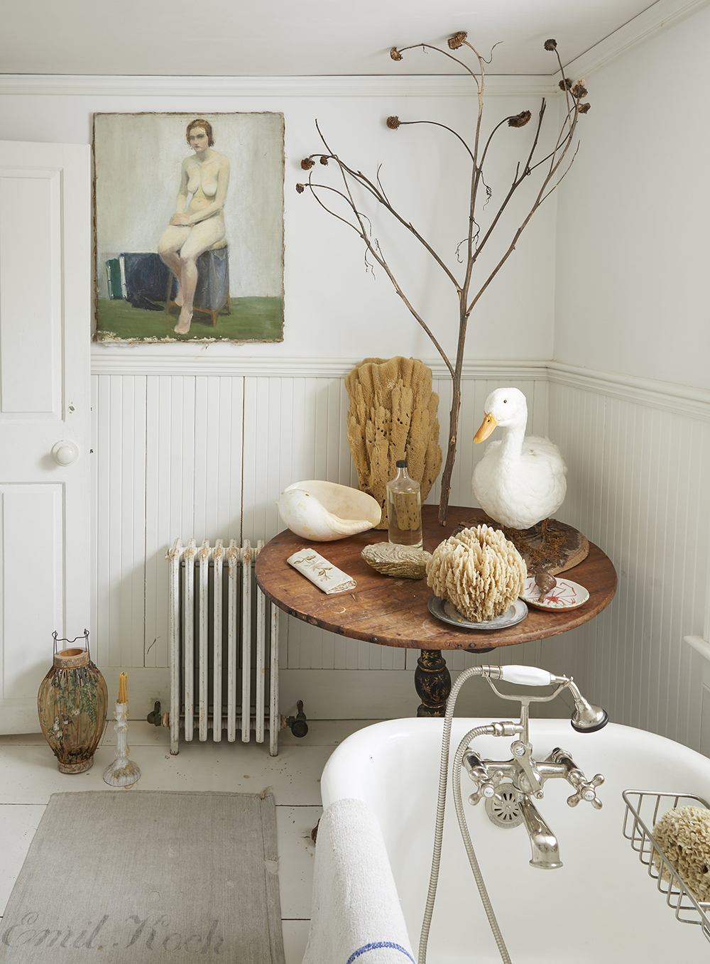 The 18th-century cape house located in Provincetown is a trove of treasures old and new. The original peeling wallpaper is surrounded by classic cottage furnishings, making it seem much more delightful than dilapidated. 