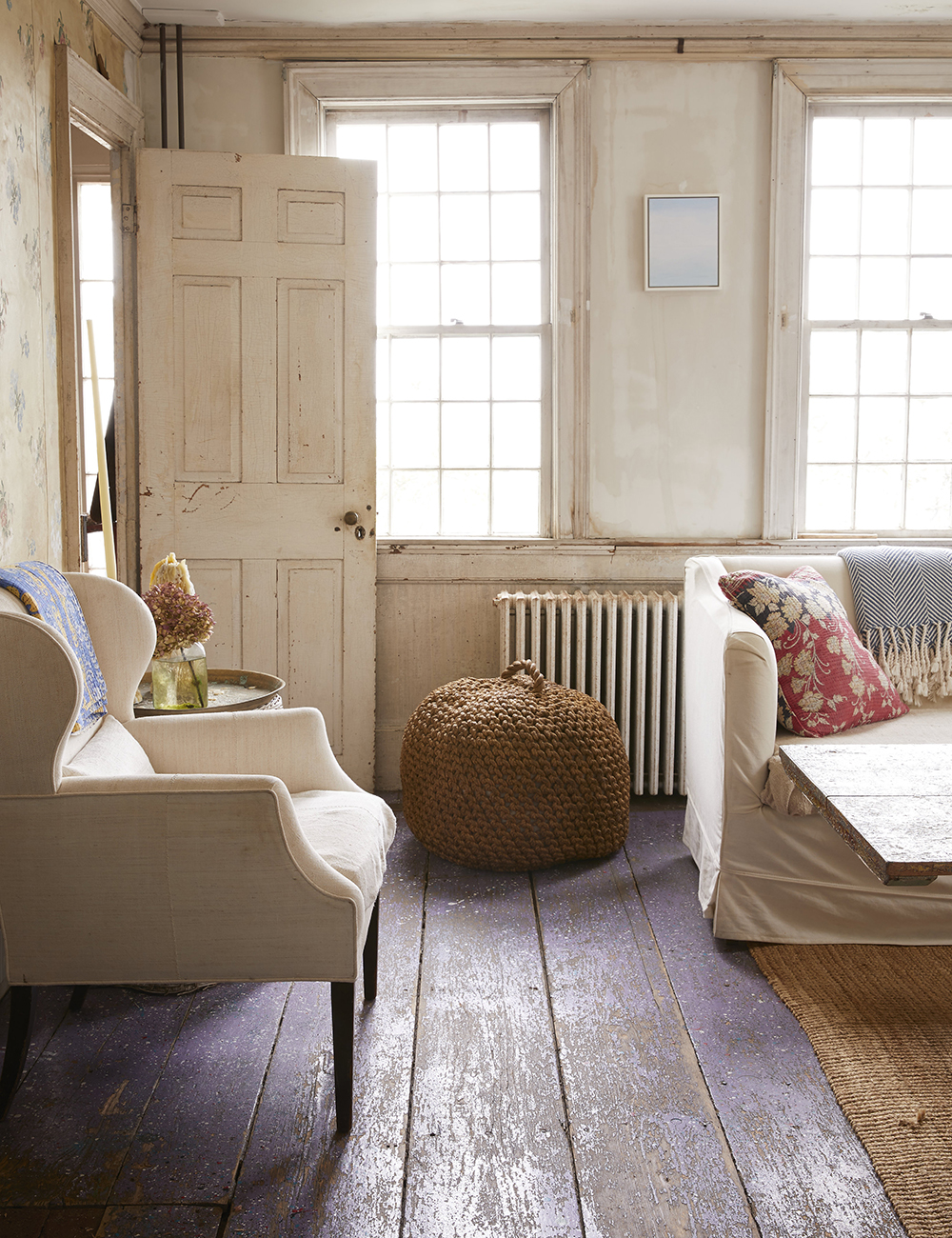 The 18th-century cape house located in Provincetown is a trove of treasures old and new. The original peeling wallpaper is surrounded by classic cottage furnishings, making it seem much more delightful than dilapidated. 