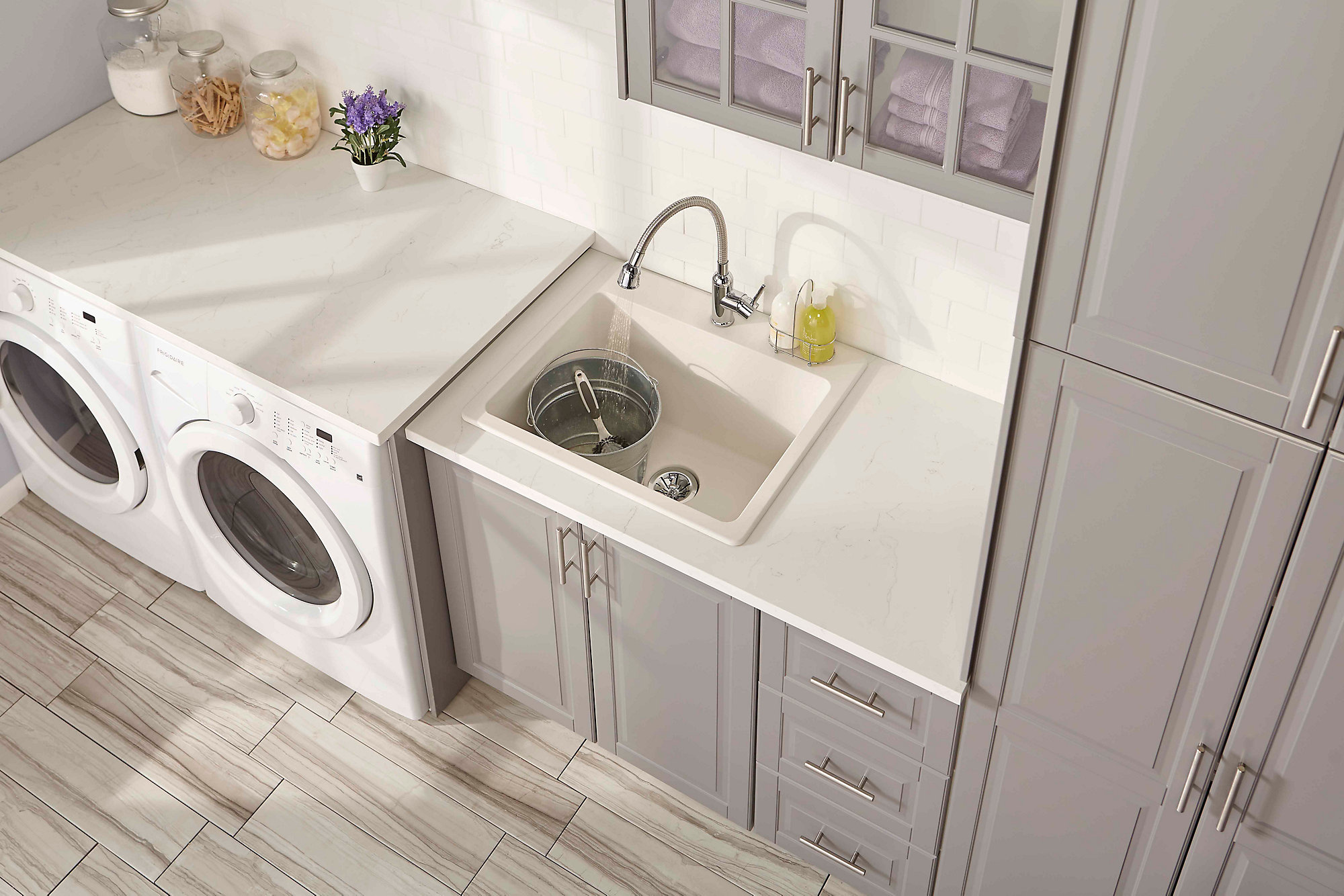 The Quartz Classic® Single Bowl Laundry Sink with Perfect Drain, shown here, is extra deep and chip-resistant.