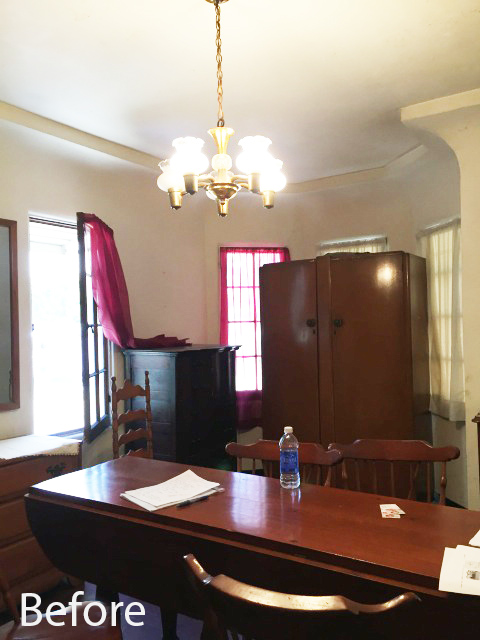 spanish bungalow bay window image, a room filled with large dark wooden furniture.