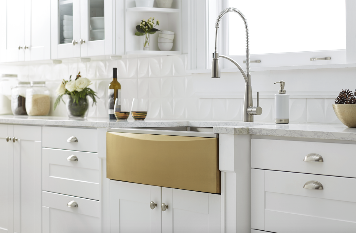 The Elkay® Crosstown® Stainless Steel Farmhouse Sink with Interchangeable Apron. The apron switches out in minutes and is available in seven colors and materials. 