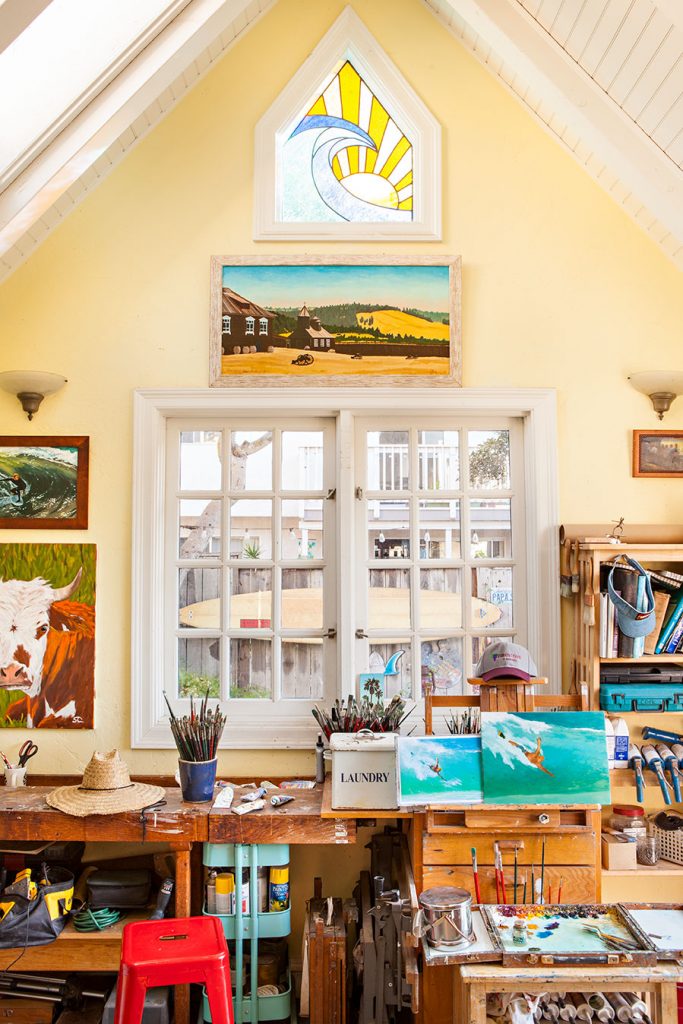 Art studio with stained glass accent wall.