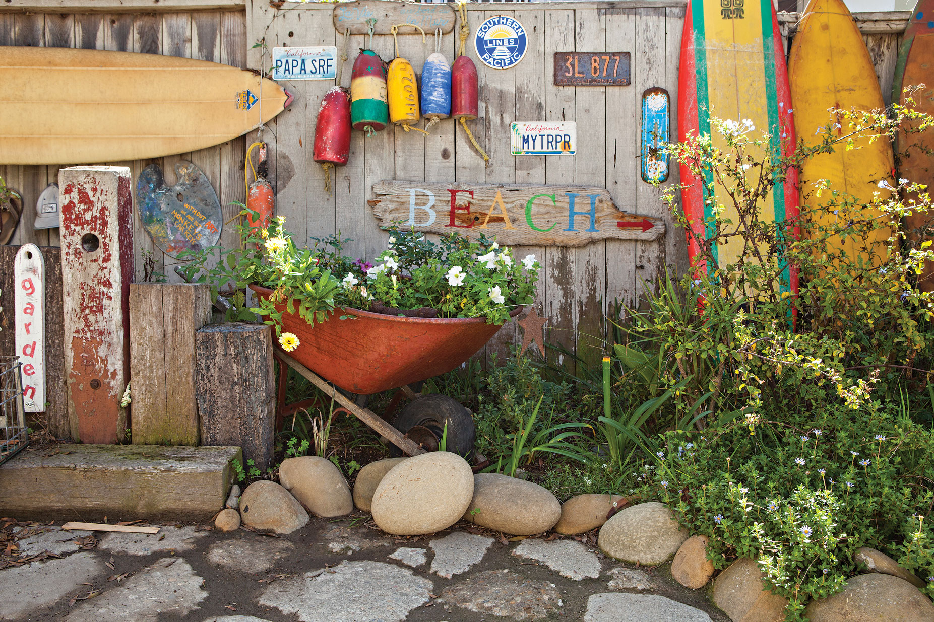 Backyard garden with creative accents.