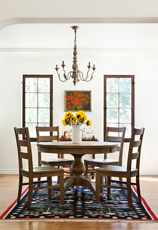 spanish bungalow dining room with chandelier