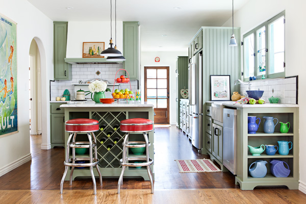 Spanish bungalow cottage kitchen makeover in light green with red vinyl barstools