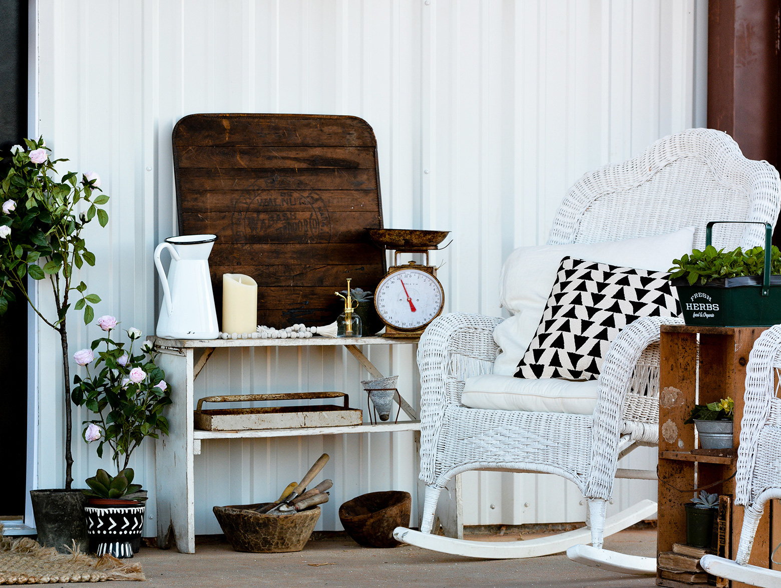 This vintage bookshelf serves as a spot to display Katie's farmhouse vignettes and can substitute as a bar top for refreshments when she’s entertaining.