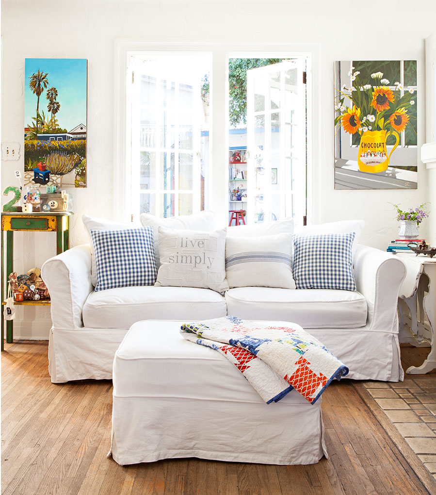 Living room with white and blue color combo.