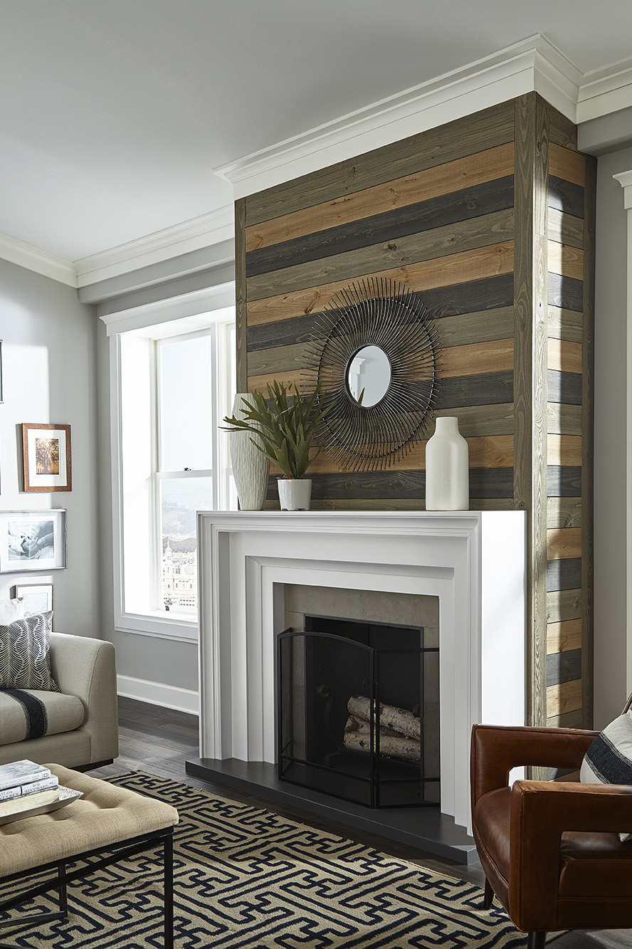 The Rustic Collection's Rough Sawn Shiplap added as an accent on a fireplace wall, shown here.