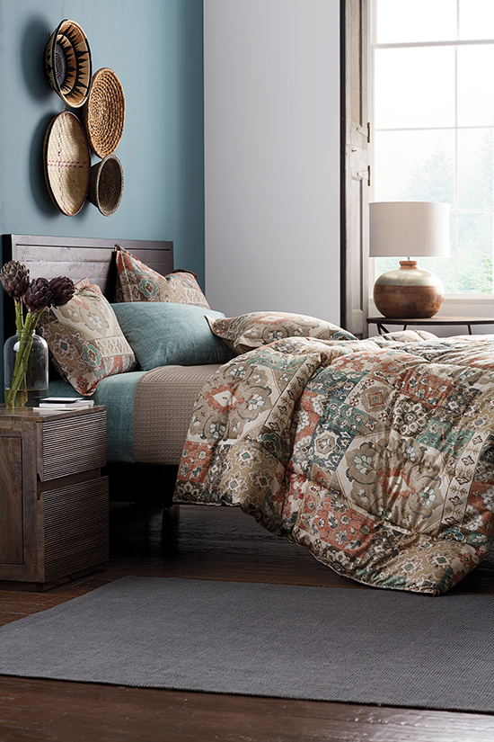 The Ankara 300-Thread Count Wrinkle-Free Sateen Down Alternative Comforter Collection from The Company Store, shown here, combine bold patterns and warm colors that are perfect for fall.