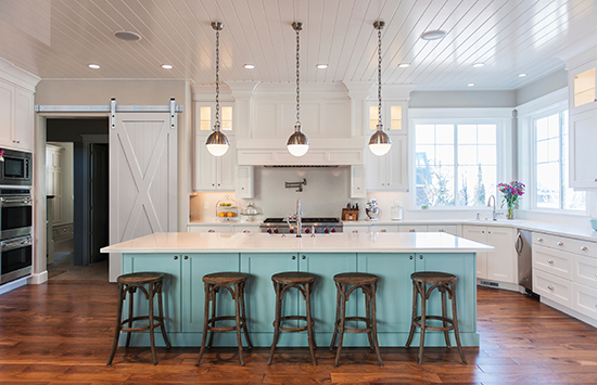 Woodgrain white sliding barn door, shown here in a kitchen.