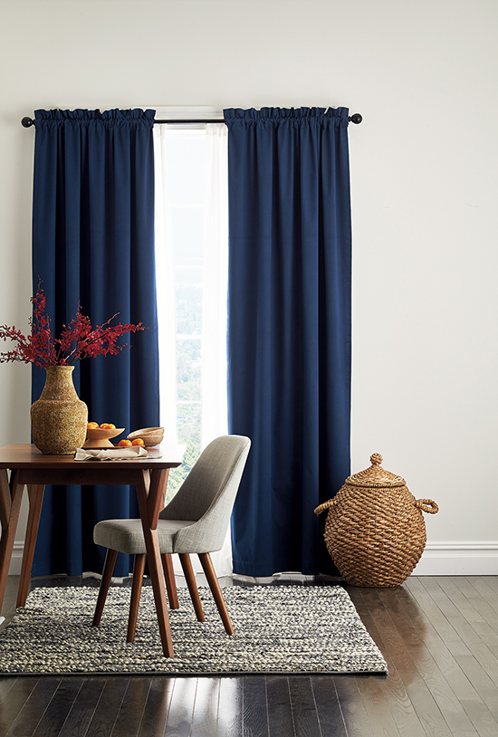 Room Darkening Window Panels from The Company Store, shown here in navy. They Block unwanted light, reduce noise, and insulate against heat and cold for reduced energy costs in summer and winter.