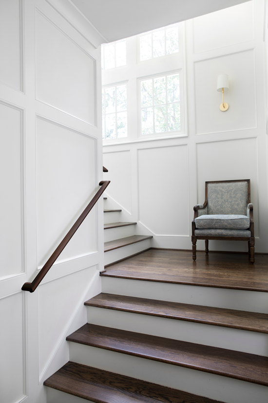 Wainscoting used on the walls in a stairway.