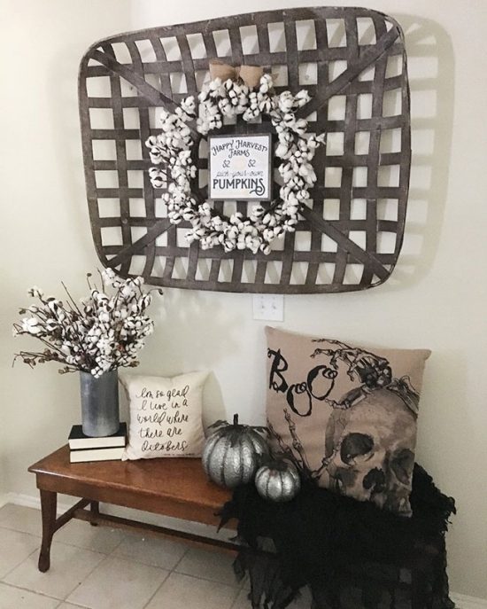 Tobacco basket decorated with a fall wreath and sign.