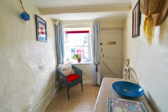 Plaster walls and a dutch door are just a couple of the quaint characters of this classically Cornish cottage.