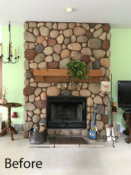 stone fireplace prior to demo