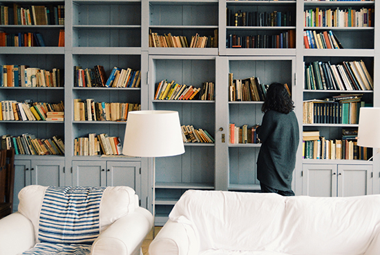 Book collection displayed on bookshelves