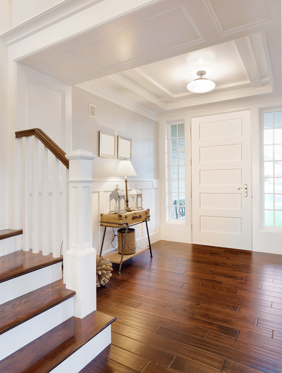 Wainscoting featured in entryway of home.