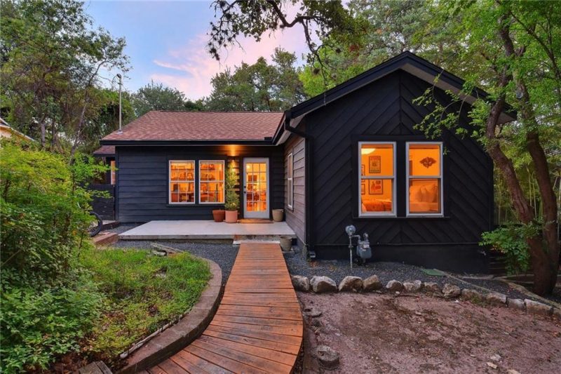 modern cottage with black paint