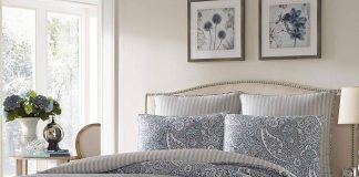 Cottage style bedding with blue paisley print