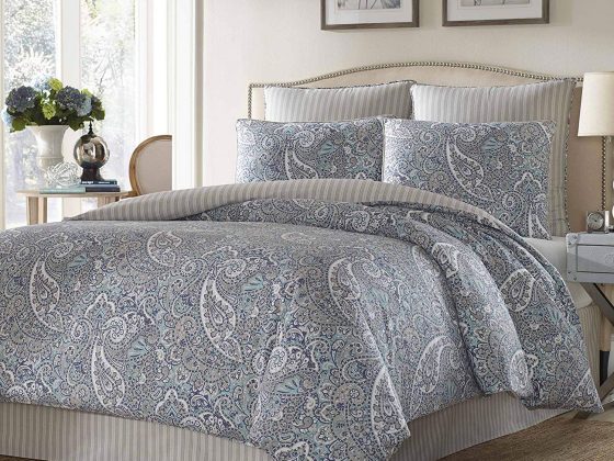 Cottage style bedding with blue paisley print