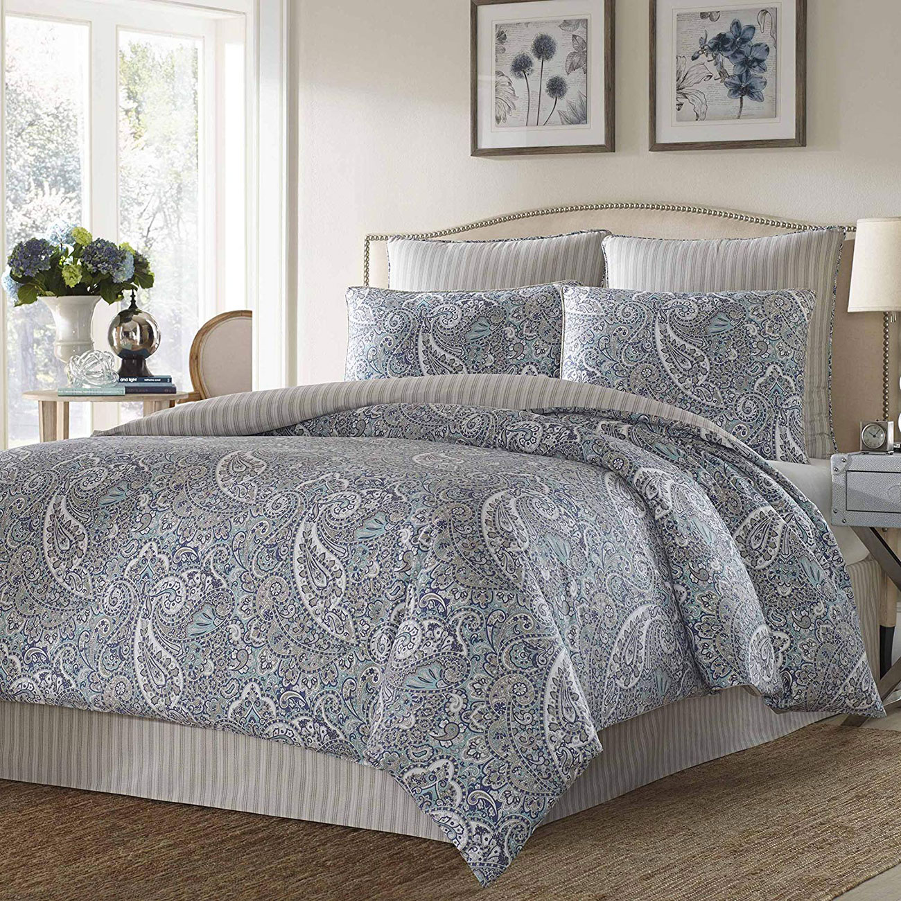 Cottage style bedding with blue paisley print