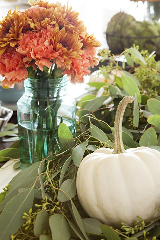 The bold floral color choices adds an inviting and warm feel to the table.