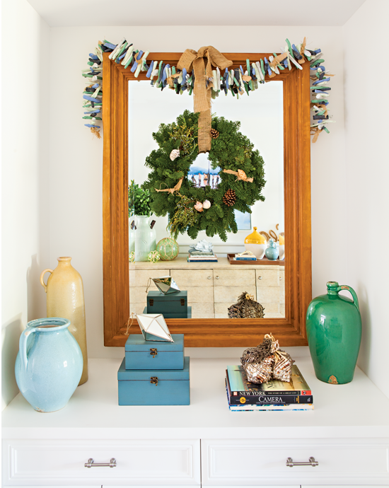 This hall mirror was turned into a work of art with driftwood garland and an earthy wreath.