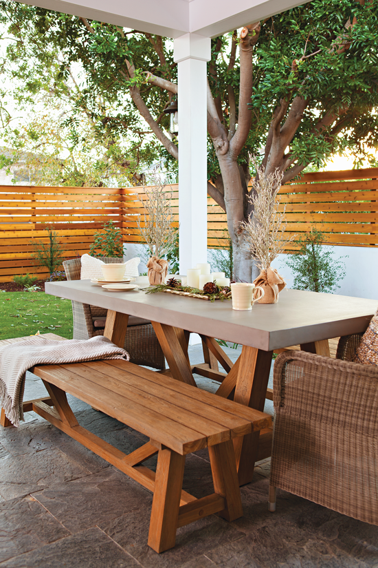 Outdoor picnic table with Christmas accent décor. // Cottages & Bungalows