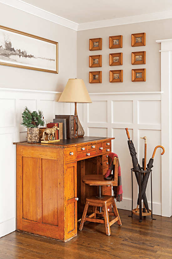 Small desk in the corner of the living room, which is typically used for drawing and artwork.